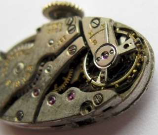 used Swiss oval lady Benrus Watch Movement complete for parts or 