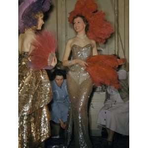 Seamstresses Adjust Performers Costumes Backstage at Folies Bergere 
