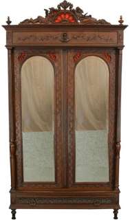 Antique French Carved Chestnut Two Door Brittany Style Armoire 