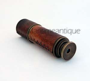   spyglass telescope 14 , leather sheathed brass telescope.  