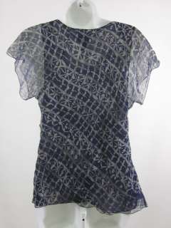   on a MAX STUDIO SPECIALTY PRODUCTS Blue Silk Print Top in a Sz M