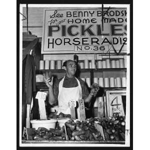 Benny Brodsky,pushcart vendor,at his stand,1940,street vendor,New York 