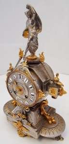   French 2 tone silver & gold gilded 8 day bell strike mantel clock