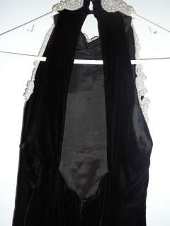 This is a very elegant black velvet gown. floor lenght made by 