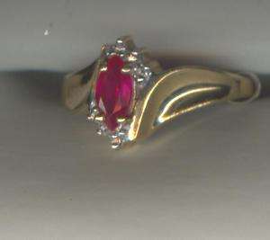 MARKED GTR AND 10K GENUINE MARQUISE RUBY RING  