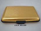   Aluma Wallet Brushed Style 7 Slots holds up to 12 Cards Gold color