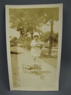 Antique Photograph Excited Child Rides Tricycle Scooter  
