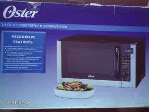 Oster 1.4 cu. ft. 1200W Counter Microwave Oven OGG61403  