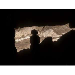  Silhouette of Hiker in Arch, Eastern California Desert, USA 